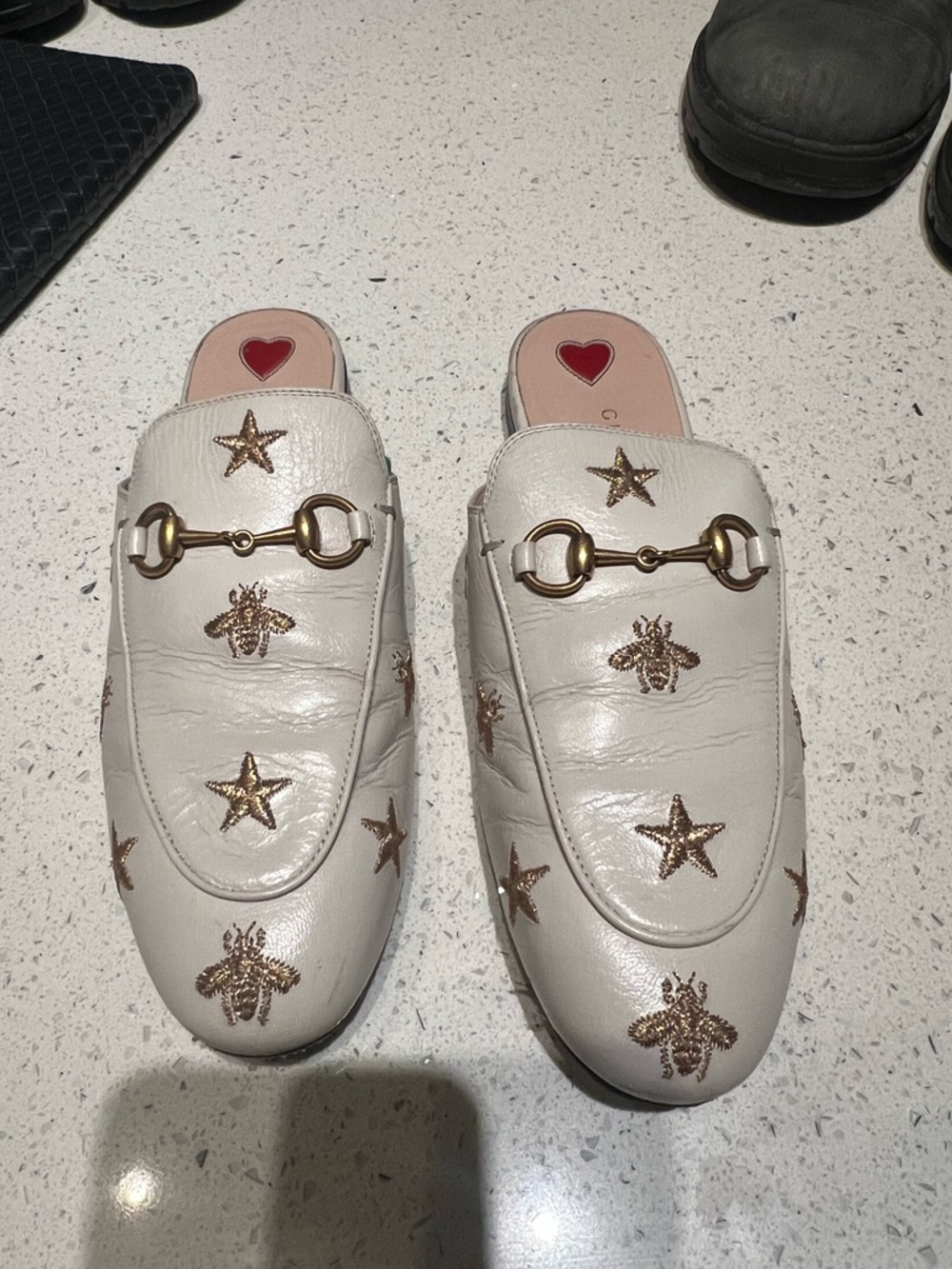 Gucci white leather gold star insect princetown mule